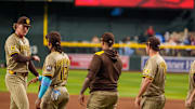 San Diego Padres pitcher Sean Reynolds (25) celebrates with his team after a victory against the Arizona Diamondbacks. at Chase Field on June 15.