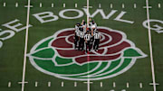 Jan 1, 2021; Arlington, TX, USA; General view as official referees meet midfield before the Rose Bowl between the Notre Dame Fighting Irish and the Alabama Crimson Tide at AT&T Stadium. 