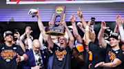 Head coach Todd Golden celebrates after leading the Florida Gators to a national championship in his third season as the head coach.