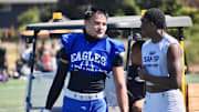 Graham-Kapowsin's Noah Flores, left, and Bethel's Zaydrius Rainey Sale participate in PLU football 11v11 Showcase in Parkland. 