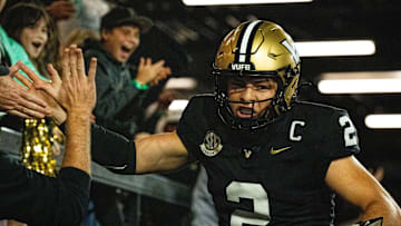 Vanderbilt Commodores quarterback Diego Pavia (2) celebrates with the fans after scoring a touchdown against South Carolina Gamecocks during the third quarter at FirstBank Stadium in Nashville, Tenn., Saturday, Nov. 9, 2024.