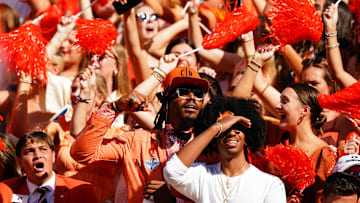 Sep 30, 2023; Auburn, Alabama, USA; Former NFL and Auburn Tigers quarterback Cam Newton cheers in the student section against the Georgia Bulldogs during the first quarter at Jordan-Hare Stadium. Mandatory Credit: John David Mercer-Imagn Images