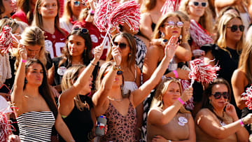 Oct 14, 2023; Tuscaloosa, Alabama, USA; Alabama Crimson Tide fans cheer from the student section against the Arkansas Razorbacks during the first quarter at Bryant-Denny Stadium. Mandatory Credit: John David Mercer-Imagn Images