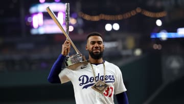 Jul 15, 2024; Arlington, TX, USA; National League outfielder Teoscar Hernandez of the Los Angeles Dodgers (37) poses with the trophy after winning the 2024 Home Run Derby at Globe Life Field. Mandatory Credit: Kevin Jairaj-USA TODAY Sports