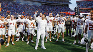 Oct 4, 2025; Gainesville, Florida, USA; Texas Longhorns head coach Steve Sarkisian stands with his team after a game against the Florida Gators at Ben Hill Griffin Stadium. 