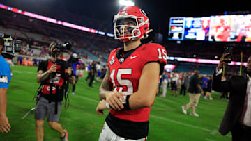 Georgia Bulldogs quarterback Carson Beck (15) walks off the field after the game of an NCAA college football matchup Saturday, Nov. 2, 2024 at EverBank Stadium in Jacksonville, Fla. The Georgia Bulldogs defeated the Florida Gators 34-20.