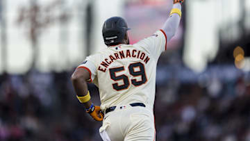 Sep 11, 2024; San Francisco, California, USA; San Francisco Giants designated hitter Jerar Encarnacion (59) gestures as he runs the bases after hitting a two-run home run against the Milwaukee Brewers during the first inning at Oracle Park. Mandatory Credit: John Hefti-Imagn Images