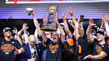 Head coach Todd Golden celebrates after leading the Florida Gators to a national championship in his third season as the head coach.