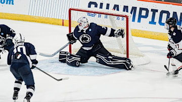 Penn State goaltender Arsenii Sergeev watches the puck against UConn in the NCAA Tournament Allentown Regional final.