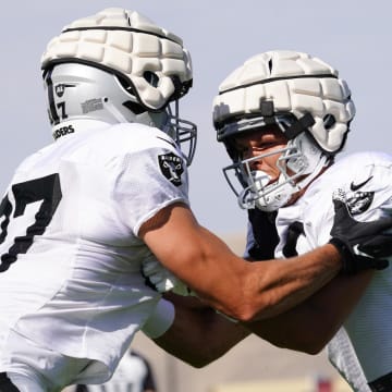Jul 28, 2022; Las Vegas, Nevada, US; Las Vegas Raiders tight ends Jesper Horsted (right) and Foster Moreau (87) run through a drill during training camp at Intermountain Healthcare Performance Center.  Mandatory Credit: Lucas Peltier-USA TODAY Sports