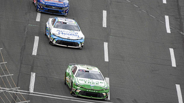 Erik Jones (43), driver Jimmie Johnson (84) and Michael McDowell (34) at Charlotte Motor Speedway.