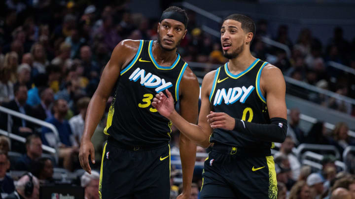 Nov 9, 2023; Indianapolis, Indiana, USA; Indiana Pacers center Myles Turner (33) and guard Tyrese Haliburton (0) in the first half against the Milwaukee Bucks at Gainbridge Fieldhouse. Mandatory Credit: Trevor Ruszkowski-USA TODAY Sports