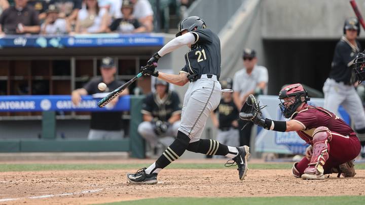 May 25, 2024; Charlotte, NC, USA; Wake Forest infielder Jack Winnay (21) hits a fly ball in the sixth inning against Florida State during the ACC Baseball Tournament at Truist Field. Mandatory Credit: Cory Knowlton-Imagn Images