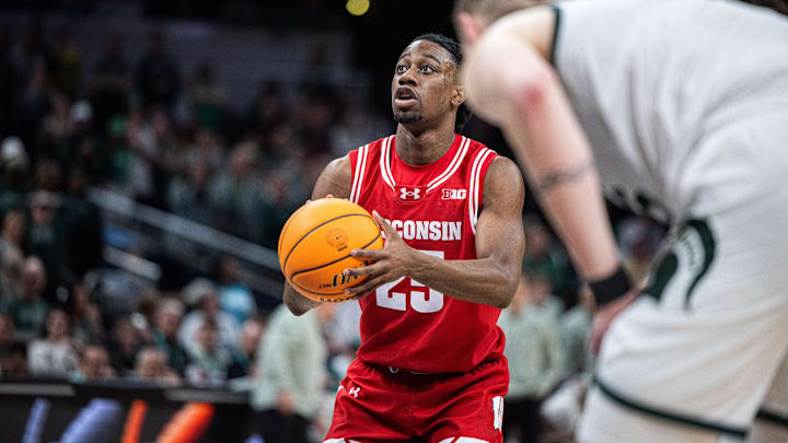 Mar 15, 2025; Indianapolis, IN, USA; Wisconsin Badgers guard John Blackwell (25) shoots the ball  in the second half against the Michigan State Spartans at Gainbridge Fieldhouse. Mandatory Credit: Trevor Ruszkowski-Imagn Images