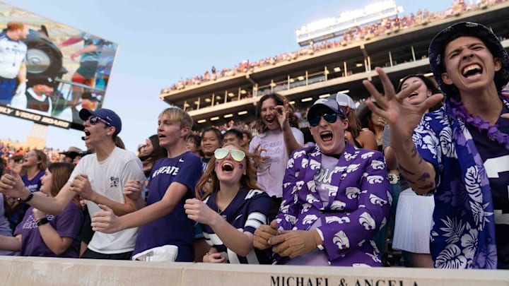 Kansas State fans yell out during the Wabash Cannonball before kickoff of the game against Arizona Friday, September 13, 2024 at Bill Snyder Family Stadium.