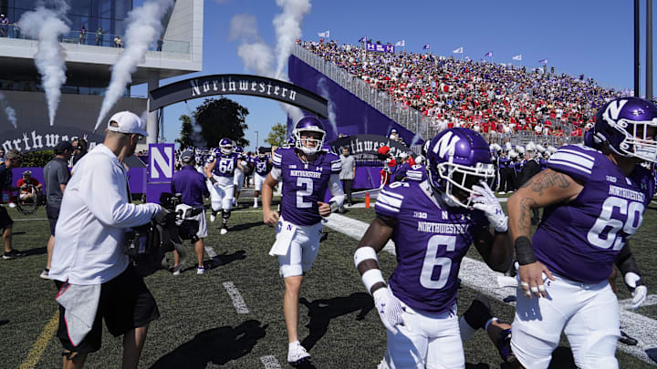 Aug 31, 2024; Evanston, Illinois, USA; The Northwestern Wildcats take the field against the Miami (Oh) Redhawks at Lanny and Sharon Martin Stadium. Mandatory Credit: David Banks-USA TODAY Sports