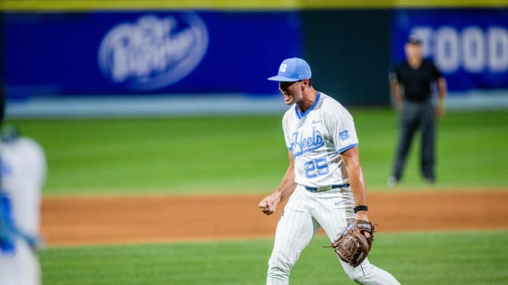 May 24, 2024; Charlotte, NC, USA; North Carolina Tar Heels pitcher Ben Peterson (25) celebrates after a strikeout to end the eleventh inning against the Wake Forest during the ACC Baseball Tournament at Truist Field. Mandatory Credit: Scott Kinser-USA TODAY Sports