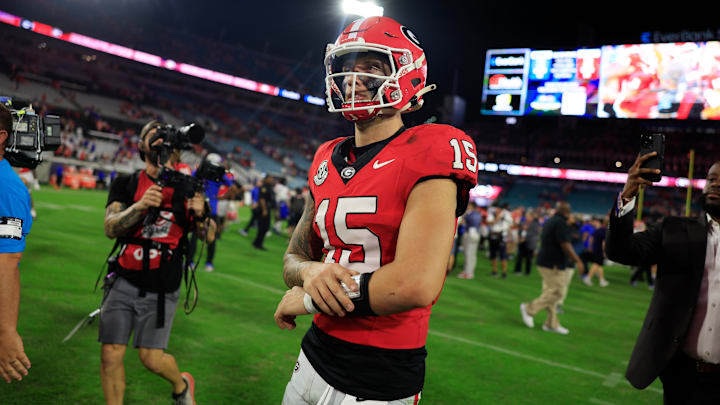 Georgia Bulldogs quarterback Carson Beck (15) walks off the field after the game of an NCAA college football matchup Saturday, Nov. 2, 2024 at EverBank Stadium in Jacksonville, Fla. The Georgia Bulldogs defeated the Florida Gators 34-20.