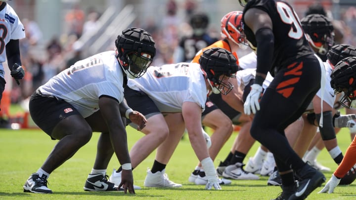 Jul 26, 2024; Cincinnati, OH, USA; Cincinnati Bengals offensive tackle Amarius Mims (71) lines up at right tackle during training camp practice at Kettering Health Practice Fields. Mandatory Credit: Kareem Elgazzar-USA TODAY Sports