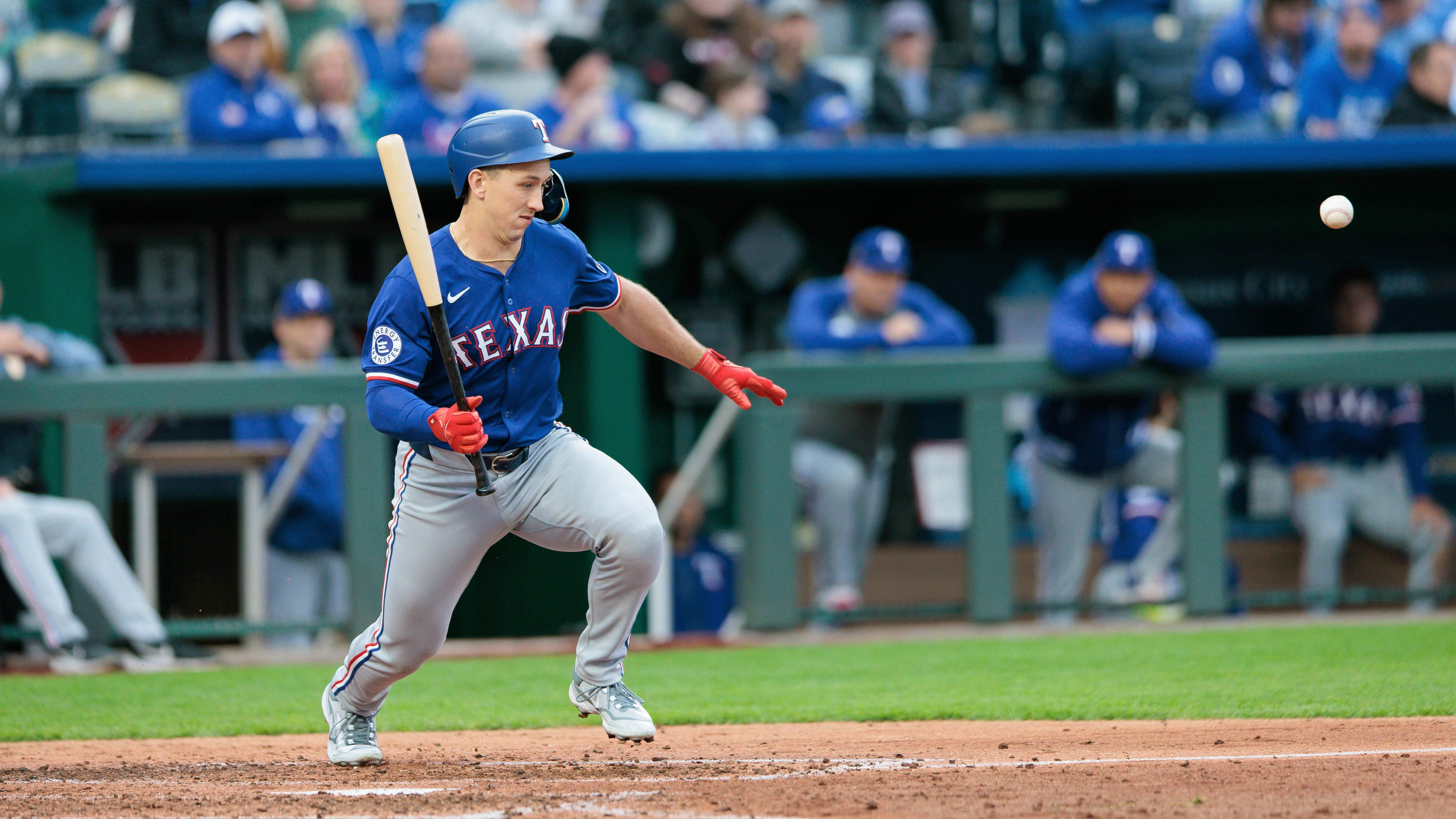 The Texas Rangers' offense explodes, but rookie Slugger exits early with an injury while out against the Royals
