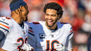 Chicago Bears quarterback Caleb Williams (18) and Chicago Bears safety Jonathan Owens (36) run onto the field before the game against the San Francisco 49ers at Levi's Stadium.