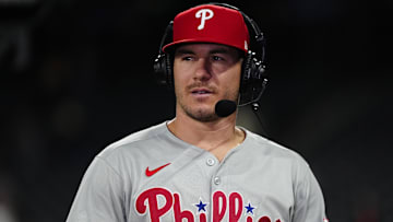Philadelphia Phillies catcher J.T. Realmuto (10) is interviewed following a win against the Colorado Rockies at Coors Field.