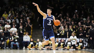 Jan 21, 2025; Boulder, Colorado, USA; Brigham Young Cougars guard Egor Demin (3) dribbles in the first half against the Brigham Young Cougars at CU Events Center. Mandatory Credit: Ron Chenoy-Imagn Images