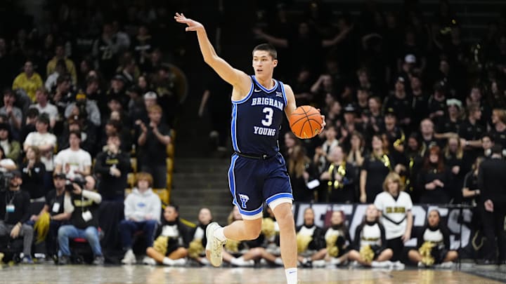 Jan 21, 2025; Boulder, Colorado, USA; Brigham Young Cougars guard Egor Demin (3) dribbles in the first half against the Brigham Young Cougars at CU Events Center. Mandatory Credit: Ron Chenoy-Imagn Images