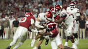 Nov 15, 2025; Tuscaloosa, Alabama, USA;  Alabama Crimson Tide defensive back Zabien Brown (2) and defensive back Keon Sabb (3) combine to tackle Oklahoma Sooners quarterback John Mateer (10) at Saban Field at Bryant-Denny Stadium. Oklahoma defeated Alabama 23-21. Mandatory Credit: Gary Cosby Jr.-Imagn Images