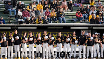 Iowa baseball players line up for the singing of the national anthem before a game against Bradley April 16, 2025 at Duane Banks Field in Iowa City, Iowa.
