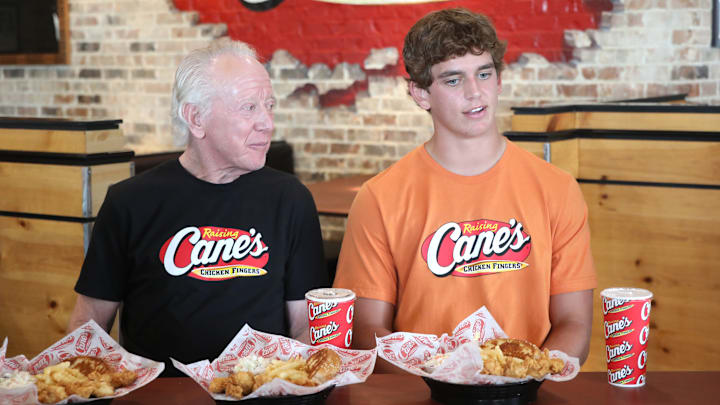 Arch, Cooper And Archie Manning Work A Pre-Manning Passing Academy "Shift" With LSU Quarterback