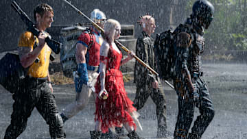 (L-r) JOEL KINNAMAN as Rick Flag, JOHN CENA as Peacemaker, MARGOT ROBBIE as Harley Quinn, PETER CAPALDI as The Thinker and IDRIS ELBA as Bloodsport in Warner Bros. Pictures’ action adventure “THE SUICIDE SQUAD,” a Warner Bros. Pictures release.. Photo: Jessica Miglio/™ & © DC Comics. © 2021 Warner Bros. Entertainment Inc. All Rights Reserved.