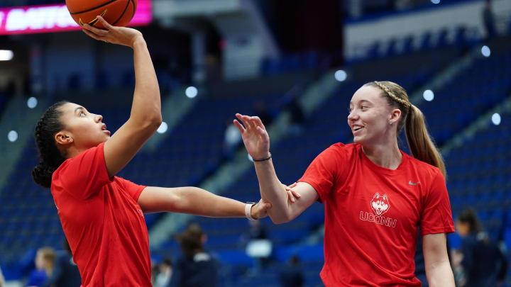 Dec 21, 2022; Hartford, Connecticut, USA; UConn Huskies guard Azzi Fudd (35) and guard Paige Bueckers (5) on the court as their teammates warm up before the start of the game against the Seton Hall Pirates at XL Center. 