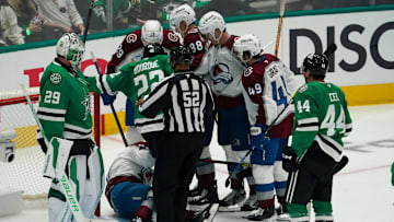 Apr 19, 2025; Dallas, Texas, USA; Colorado Avalanche left wing Artturi Lehkonen (62) is helped up by teammates after scoring a goal during the second period in game one of the first round of the 2025 Stanley Cup Playoffs against the Dallas Stars at American Airlines Center. Mandatory Credit: Raymond Carlin III-Imagn Images