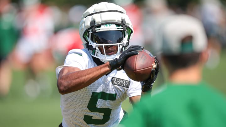 Jul 27, 2024; Florham Park, NJ, USA; New York Jets wide receiver Garrett Wilson (5) catches the ball during a drill during training camp at Atlantic Health Jets Training Center.