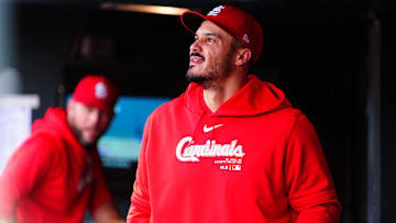 Sep 26, 2024; Denver, Colorado, USA; St. Louis Cardinals third base Nolan Arenado (28) in the dugout in the eighth inning against the Colorado Rockies at Coors Field. Mandatory Credit: Ron Chenoy-Imagn Images