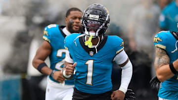 Jacksonville Jaguars running back Travis Etienne Jr. (1) runs on the field before an NFL football matchup Sunday, Dec. 15, 2024 at EverBank Stadium in Jacksonville, Fla. 