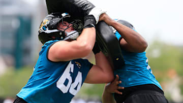 Jacksonville Jaguars guard Wyatt Milum (64) drills with guard Sal Wormley (61) during a rookie minicamp at Miller Electric Center Saturday, May 10, 2025 in Jacksonville, Fla. [Corey Perrine/Florida Times-Union]