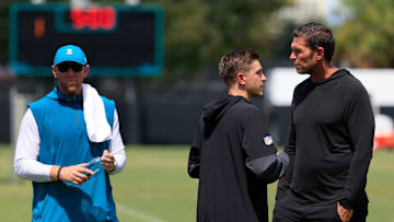 From left, Jacksonville Jaguars head coach Liam Coen, general manager James Gladstone and Tony Boselli, executive vice president of football operations, talk after an NFL training camp session at the Miller Electric Center, Thursday, Aug. 14, 2025 in Jacksonville, Fla.