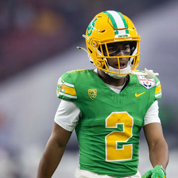 Jan 1, 2024; Glendale, AZ, USA; Oregon Ducks wide receiver Gary Bryant Jr. (2) against the Liberty Flames during the 2024 Fiesta Bowl at State Farm Stadium. Mandatory Credit: Mark J. Rebilas-Imagn Images