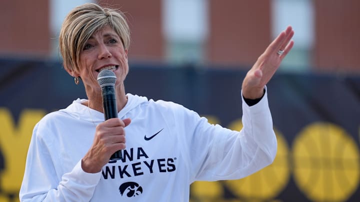 Iowa women’s basketball head coach Jan Jensen speaks to the crowd during the Hawkeye Hoops from Downtown event Oct. 17, 2025 on the University of Iowa campus in Iowa City, Iowa.