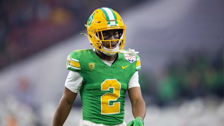 Jan 1, 2024; Glendale, AZ, USA; Oregon Ducks wide receiver Gary Bryant Jr. (2) against the Liberty Flames during the 2024 Fiesta Bowl at State Farm Stadium. Mandatory Credit: Mark J. Rebilas-Imagn Images