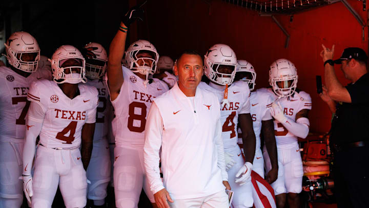 Texas Longhorns head coach Steve Sarkisian leads the team out of the tunnel before a game against the Florida Gators.