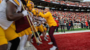 Minnesota head coach P.J. Fleck is shown with his team before their game at Camp Randall Stadium