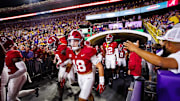 Nov 9, 2024; Baton Rouge, Louisiana, USA;  Alabama Crimson Tide defensive back Bray Hubbard (18) runs onto the field before their game against the LSU Tigers at Tiger Stadium. Mandatory Credit: Stephen Lew-Imagn Images