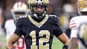 Sep 14, 2025; New Orleans, Louisiana, USA;  New Orleans Saints wide receiver Chris Olave (12) looks on against the San Francisco 49ers during the first half at Caesars Superdome. Mandatory Credit: Stephen Lew-Imagn Images