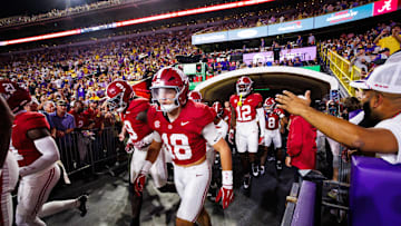 Nov 9, 2024; Baton Rouge, Louisiana, USA;  Alabama Crimson Tide defensive back Bray Hubbard (18) runs onto the field before their game against the LSU Tigers at Tiger Stadium. Mandatory Credit: Stephen Lew-Imagn Images