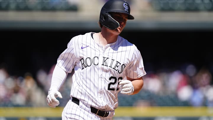 Aug 3, 2025; Denver, Colorado, USA; Colorado Rockies center fielder Mickey Moniak (22) runs off a two run home run in the sixth inning against the Pittsburgh Pirates at Coors Field.