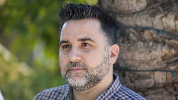 Atlanta Braves president of baseball operations Alex Anthopoulos speaks to the media during the MLB GM Meetings in 2023.