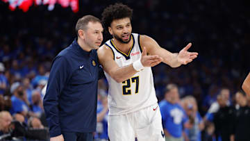 May 18, 2025; Oklahoma City, Oklahoma, USA; Denver Nuggets guard Jamal Murray (27) talks to Denver Nuggets head coach David Adelman after a play against the Oklahoma City Thunder in the second quarter during game seven of the second round for the 2025 NBA Playoffs at Paycom Center. Mandatory Credit: Alonzo Adams-Imagn Images